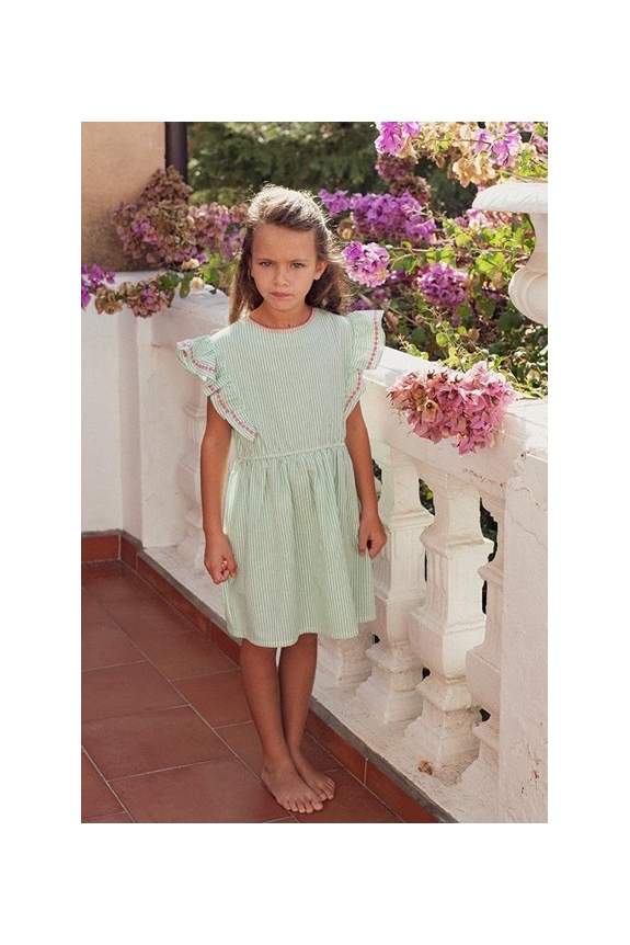 Fillette portant robe Giulia rayée verte Marlot Paris avec fleurs